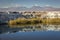 Volcanic landscape and salt lake reflection at sunset in Atacama Desert, Chile