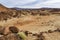 Volcanic landscape with sparse vegetation