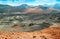 Volcanic landscape in Timanfaya National Park on Lanzarote, Canary Islands, Spain. Dramatic views of volcano craters and