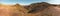 Volcanic landscape and unpaved road in desert. Death Valley, California