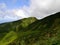 volcanic mountains covered by luxuriant vegetation in guadeloupe national park on chemin des dames to grande soufriere summit