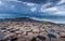 Volcanic Rock Columns of Giants Causeway under Stormy Sky, Northern Ireland