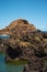 volcanic rock formation near coastline, Ilheu Mole, Madeira Island