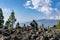 Volcanic rocks looking towards moutain range at Mirador del Llano del Jable, La Palma, Canary Islands