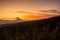 Volcano in the background with a cornfield