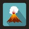 Volcano erupting icon, flat style