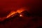 Volcano eruption landscape at night - Mount Etna in Sicily