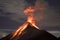 Volcano eruption with lava captured at night, on the Volcano Fuego in Guatemala