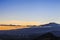 Volcano etna erupting at sunset