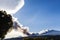 Volcano etna erupting at sunset steam clouds