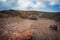 Volcano Etna view Silvestri crater with big stone in front