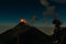 Volcano Fuego erupting at night from view of Volcano Acatenango, Guatemala