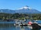 Volcano Villarica and boats in lake