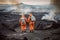 Volcanologists in fire-protective suits exploring volcanic landscape