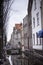 Voldersgracht on a moody rainy winter day. Beautiful canal houses build next to the canal