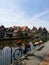 Volendam, Amsterdam/Netherlands-June 25, 2019- Tranquil Scenery from one of a Volendam street with small houses, river and the