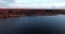 Volga river in autumn at sunrise aerial view quadcopter over forest 4k.