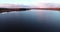 Volga river in autumn at sunrise aerial view quadcopter over forest 4k.