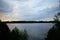 Volga river. On the banks of the river villages and forests. Sky clouds. Steep and precipitous banks, covered with trees that look