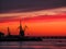 Volga river. Silhouettes of cranes.