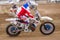 Volgograd, Russia - April 19, 2015: Motorcycle racer racing on dirt track, at the stage of the Open Championship Motorcycle Cross