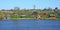 Volkhov river panorama with houses at the shore
