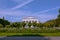 Volksgarten Public Park in Vienna, view on Theseus temple. Column Hall in the garden with beautiful colorful landscape