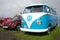 The Volkswagen Beetle car and microbus of Volkswagen T1 Kombi of the 1950th years at an exhibition parade of a retro cars