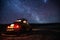 Volkswagen Beetle classic under a sky full of stars