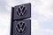 Volkswagen dealership sign and new modern logo front of store German automaker shop