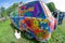 Volkswagen Transporter and line drawing colored paints children beetle in the meadow