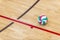 Volleyball ball on hardwood volleyball court. Team sport