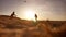 Volleyball. Men play sport volleyball on the beach silhouette sun sunset