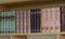 Volumes of Islamic religion books placed on a shelf of a school library