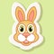 Volumetric sticker with a picture of a rabbit in cartoon style.