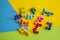 Voluminous multi-colored details of a puzzle for a game of logic are scattered
