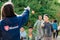 Volunteer from a charity company playing with poor children in a Romanian hellhole