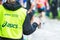 Volunteer gives out mugs with water in a depot in the ASICS Stockholm Marathon 2014