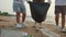 Volunteer happy family picking plastic bottle into trash plastic bag black for cleaning beach