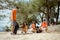 Volunteer picking up garbage activity on the beach after tourist resting in holidays