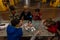 a volunteer teacher plays with children living in the Kharviv metro