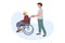 Volunteer young man is walking an older grey haired woman on a wheelchair. 5 December the International Volunteer Day