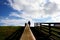 Volunteering on a farm - silhouette of a girl holding pitchfork