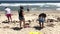 Volunteers clean the beach during International Coastal Cleanup day