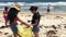 Volunteers clean the beach during International Coastal Cleanup day