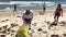 Volunteers clean the beach during International Coastal Cleanup day