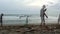 Volunteers clean plastic garbage on the beach. Cleaning the beach from plastic debris. ocean rescue