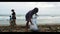 Volunteers clean plastic garbage on the beach. Cleaning the beach from plastic debris. ocean rescue