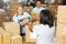 Volunteers Collecting Food Donations In Warehouse