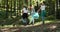 Volunteers collecting trash in the woods